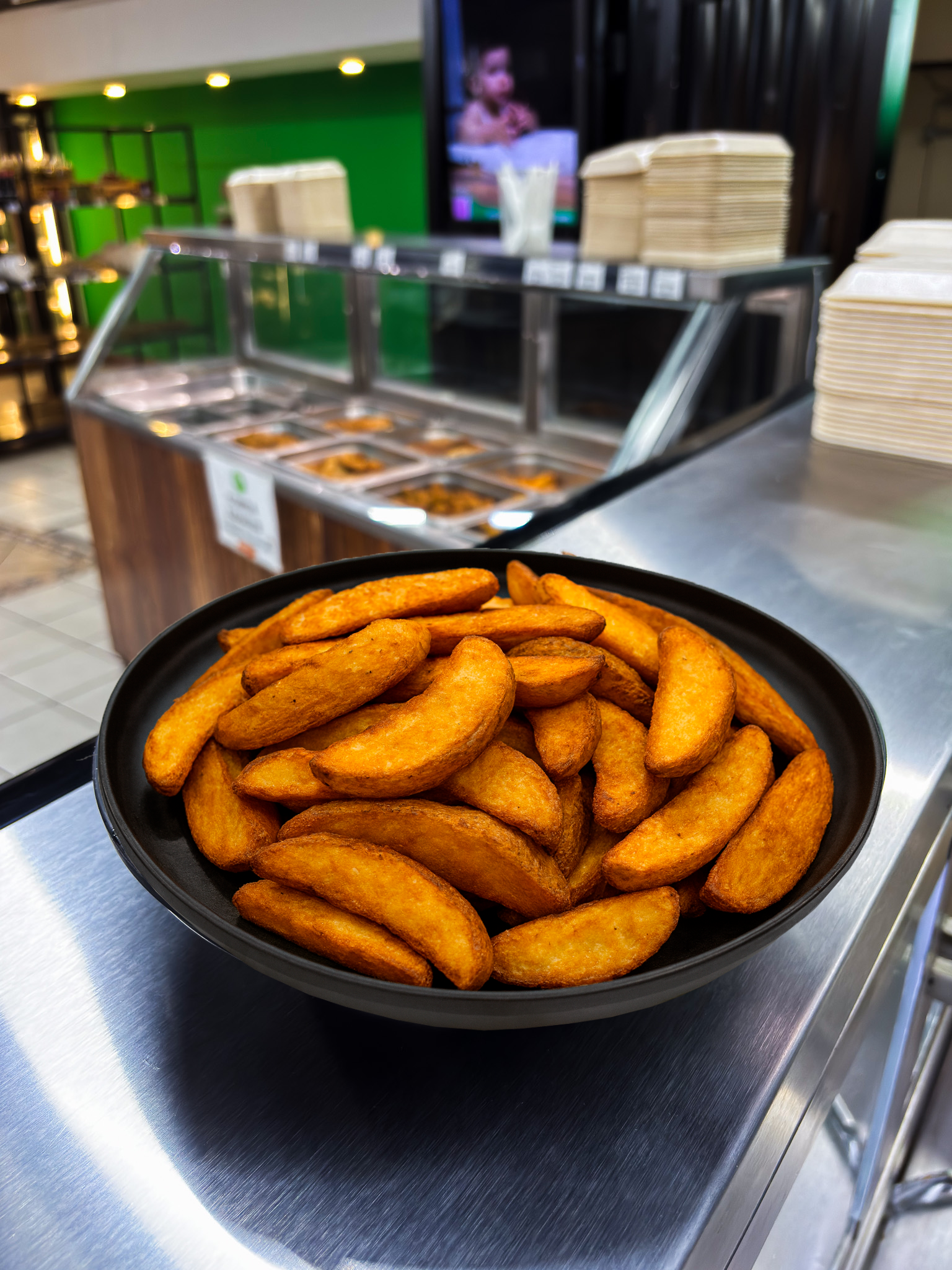 Papas fritas en gajo sazonada (C)